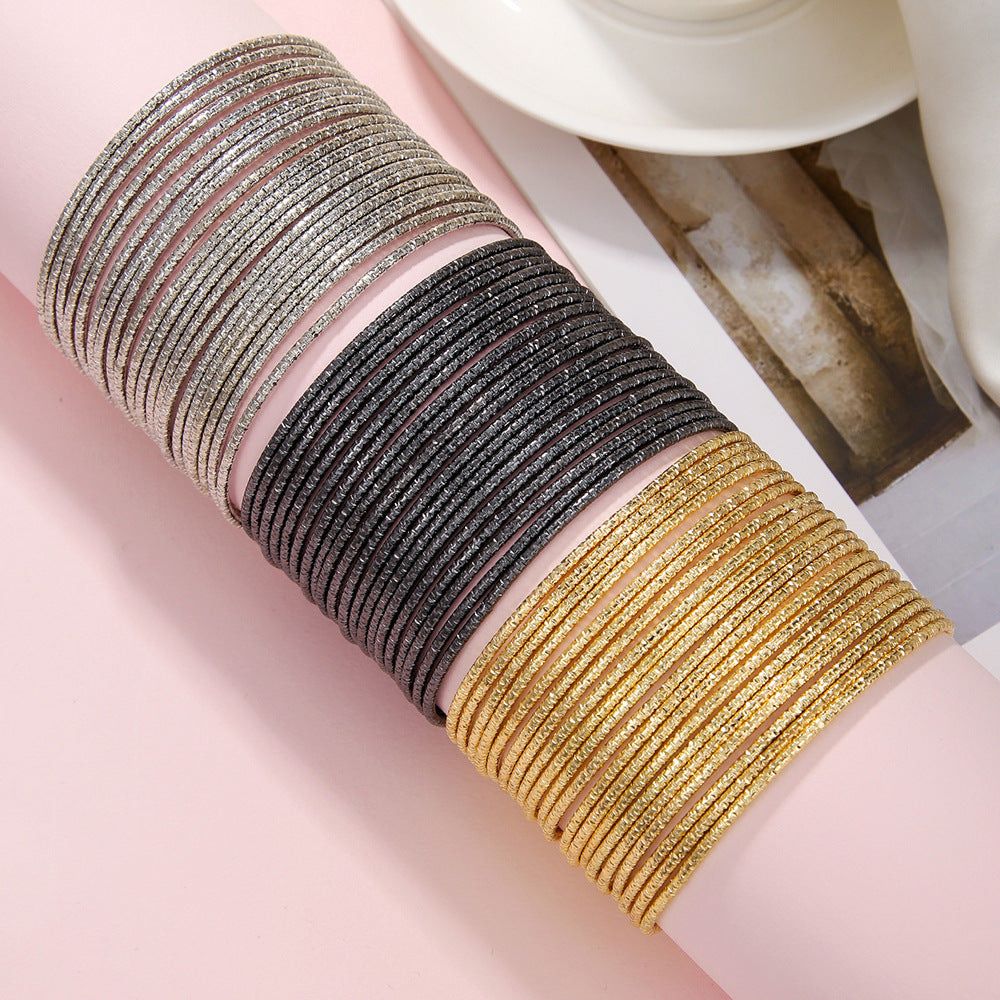 A set of 20 multi-layer gypsy star stacked bracelets, European and American fashion bohemian style ring metal bracelet combination