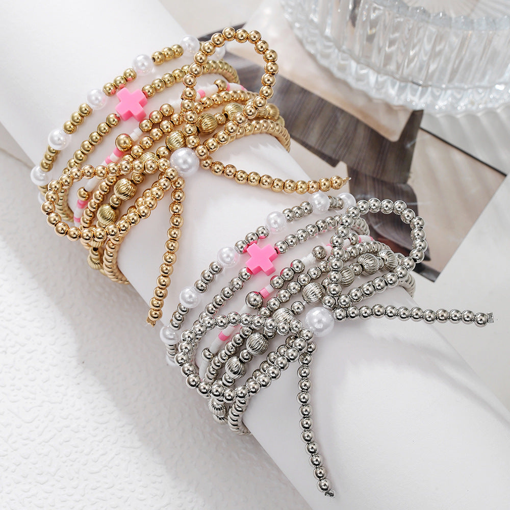 European and American cross-border hand jewelry personalized bow beaded cross multi-layer bracelet INS style imitation pearl bracelet women