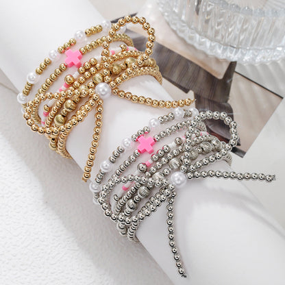 European and American cross-border hand jewelry personalized bow beaded cross multi-layer bracelet INS style imitation pearl bracelet women