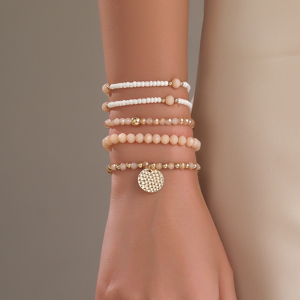 Bohemian fashionable and elegant elastic glass rice bead bracelet set, send girlfriends and girlfriends small fresh stacked bracelets
