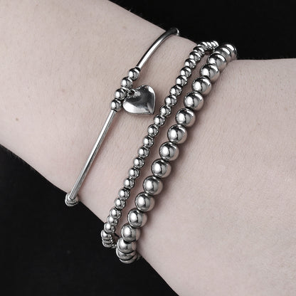 European and American cross-border hand jewelry stainless steel love pendant metal wind bracelet combination sweet cool beaded stacked bracelet women