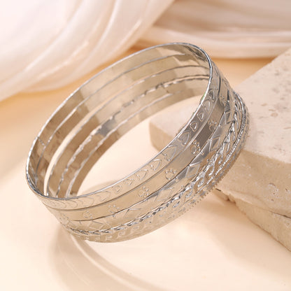 Europe and the United States cross-border stacking Bohemian metal bracelet set retro exaggerated mixing and matching hollow love bracelet jewelry