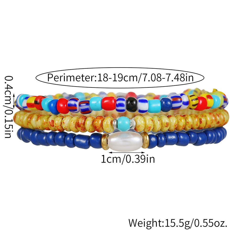 Bohemian vacation style elastic rice bead bracelet ins design sense niche contrasting colors stacked pearl men's bracelet