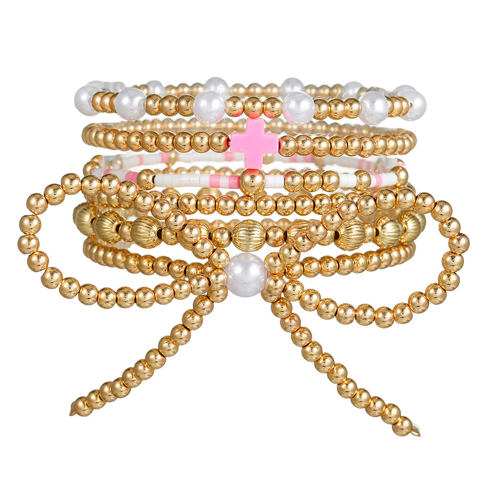 European and American cross-border hand jewelry personalized bow beaded cross multi-layer bracelet INS style imitation pearl bracelet women