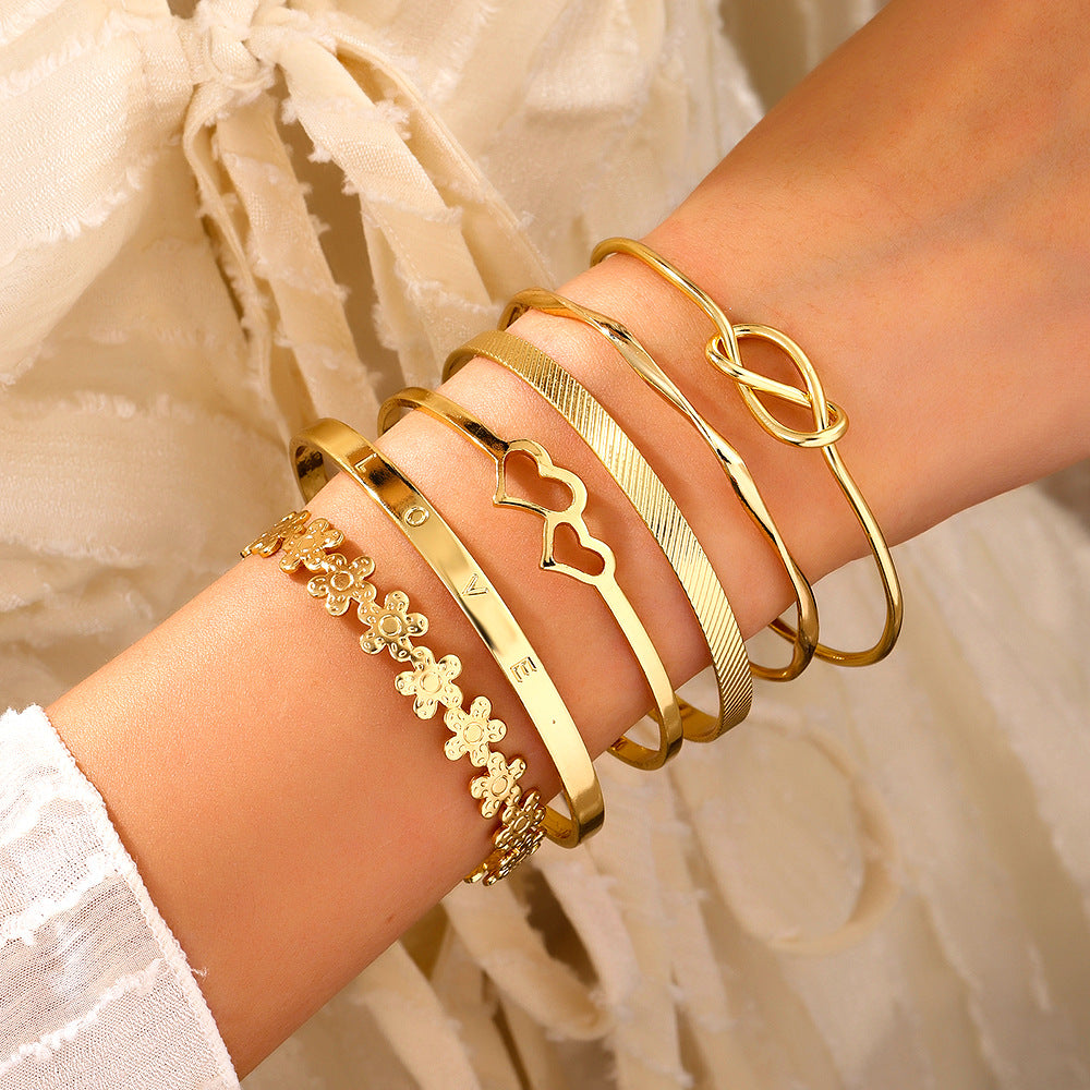 European and American cross-border alloy love knotted flower bracelet set geometric metal cross-stacked wear LOVE open bracelet
