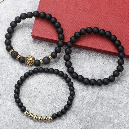 Cross-border new 6/8mm black matte volcanic stone beaded bracelet set combination lion head elastic bracelet bracelet.