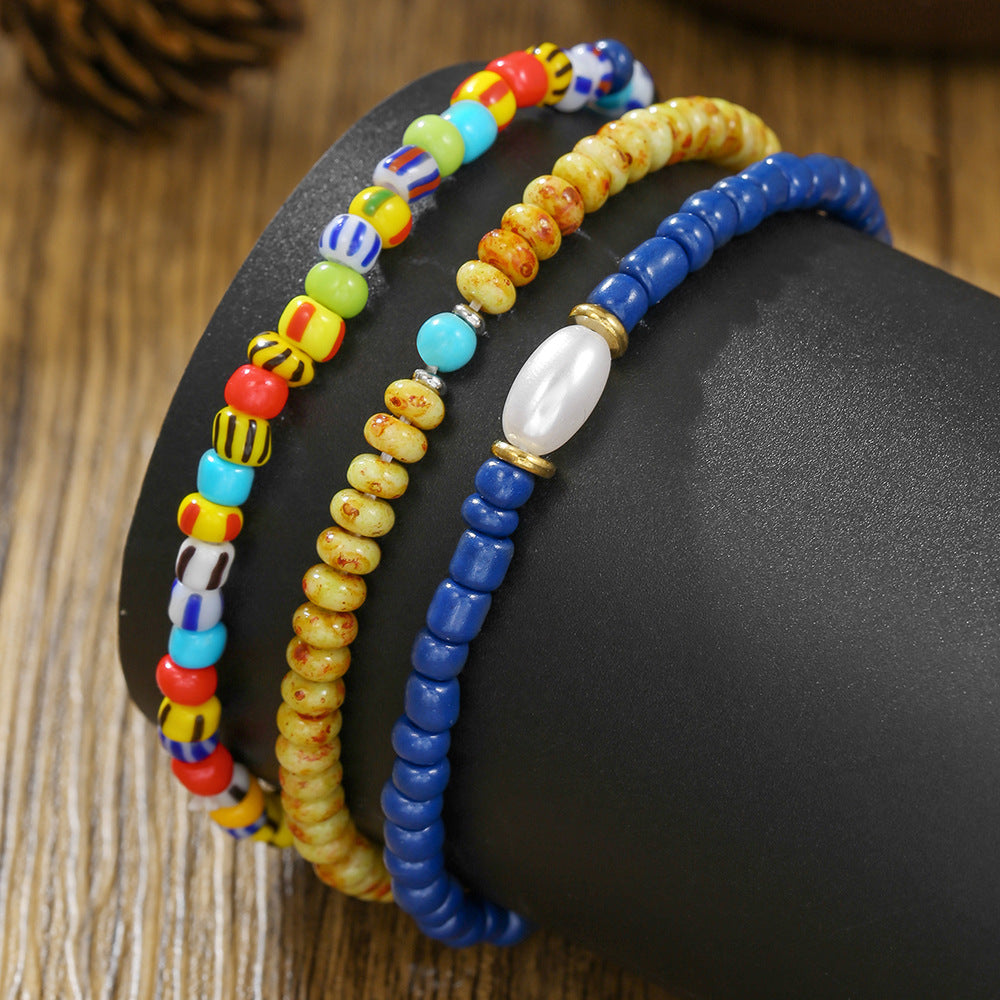 Bohemian vacation style elastic rice bead bracelet ins design sense niche contrasting colors stacked pearl men's bracelet