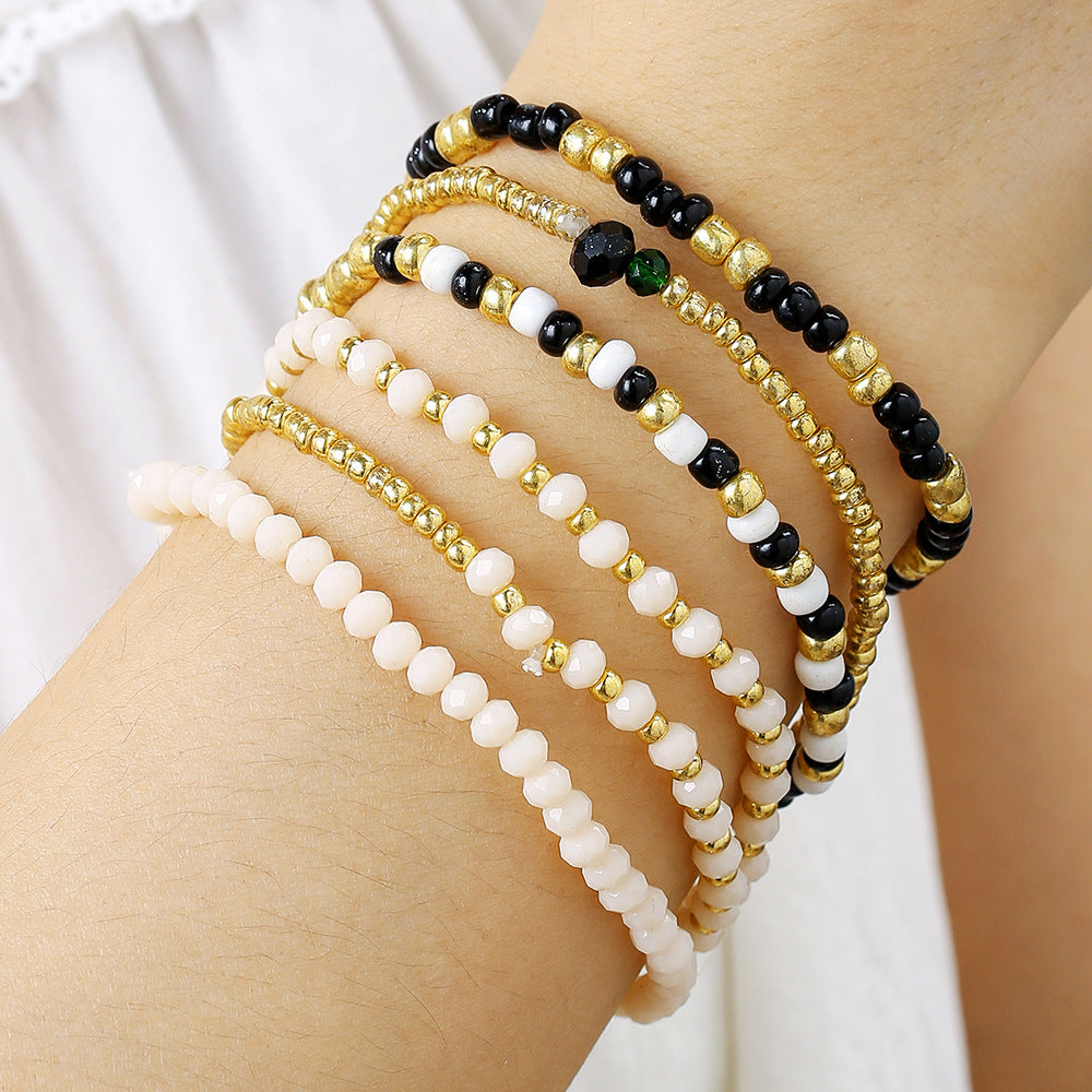 Bohemian vacation wind stacked wearing couple bracelet ins wind niche design sense rice bead elastic bracelet bracelet female