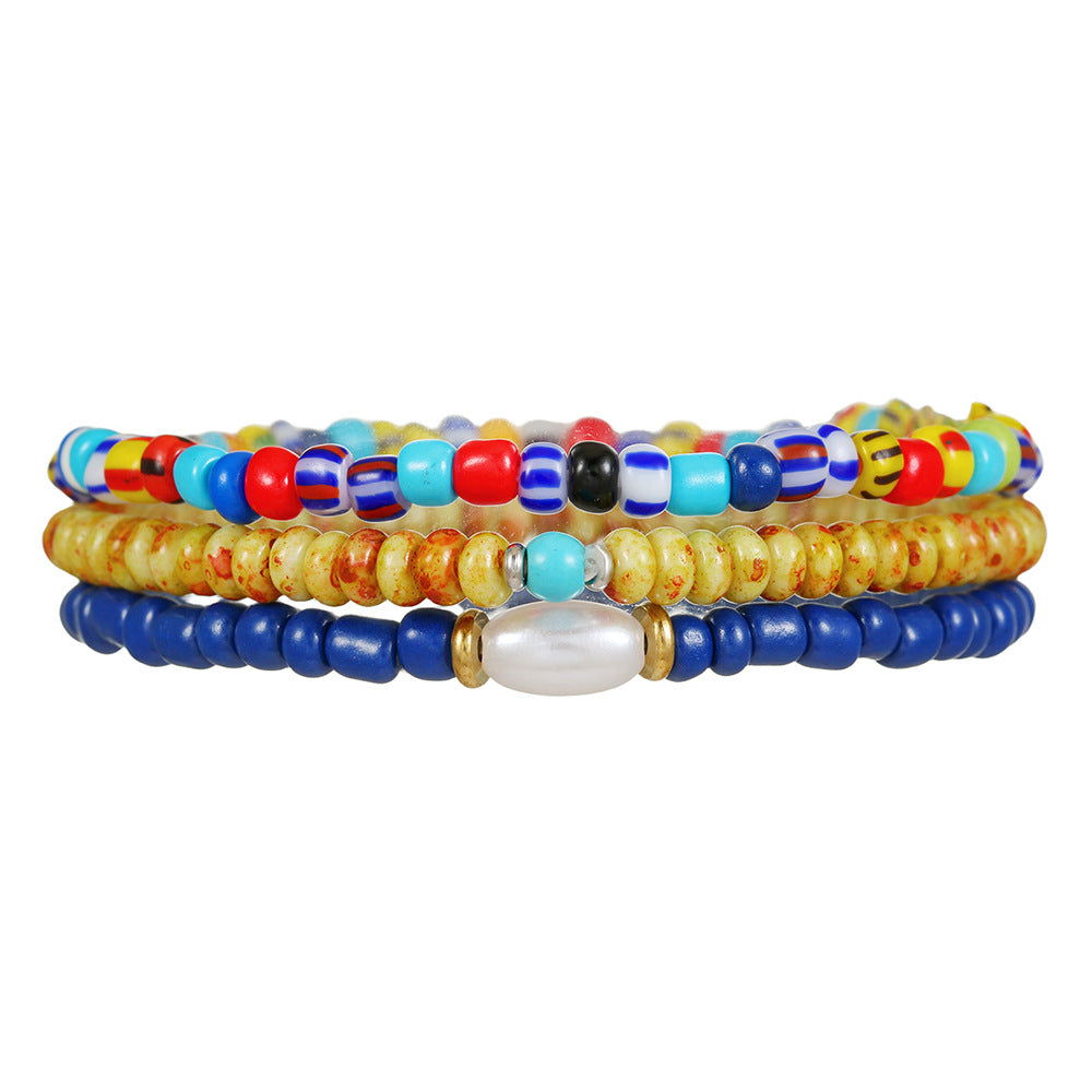 Bohemian vacation style elastic rice bead bracelet ins design sense niche contrasting colors stacked pearl men's bracelet
