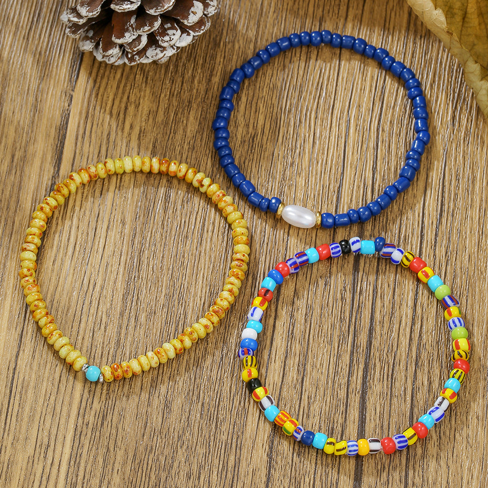 Bohemian vacation style elastic rice bead bracelet ins design sense niche contrasting colors stacked pearl men's bracelet