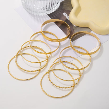 Cross-border new metal bracelet set, female exaggerated bohemian feng shui ripple smooth surface stacked bracelet 10-piece set