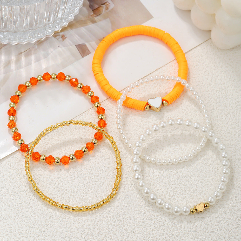 European and American children's bracelet set Bohemian elastic beaded pearl bracelet dripping oil love soft pottery friendship bracelet