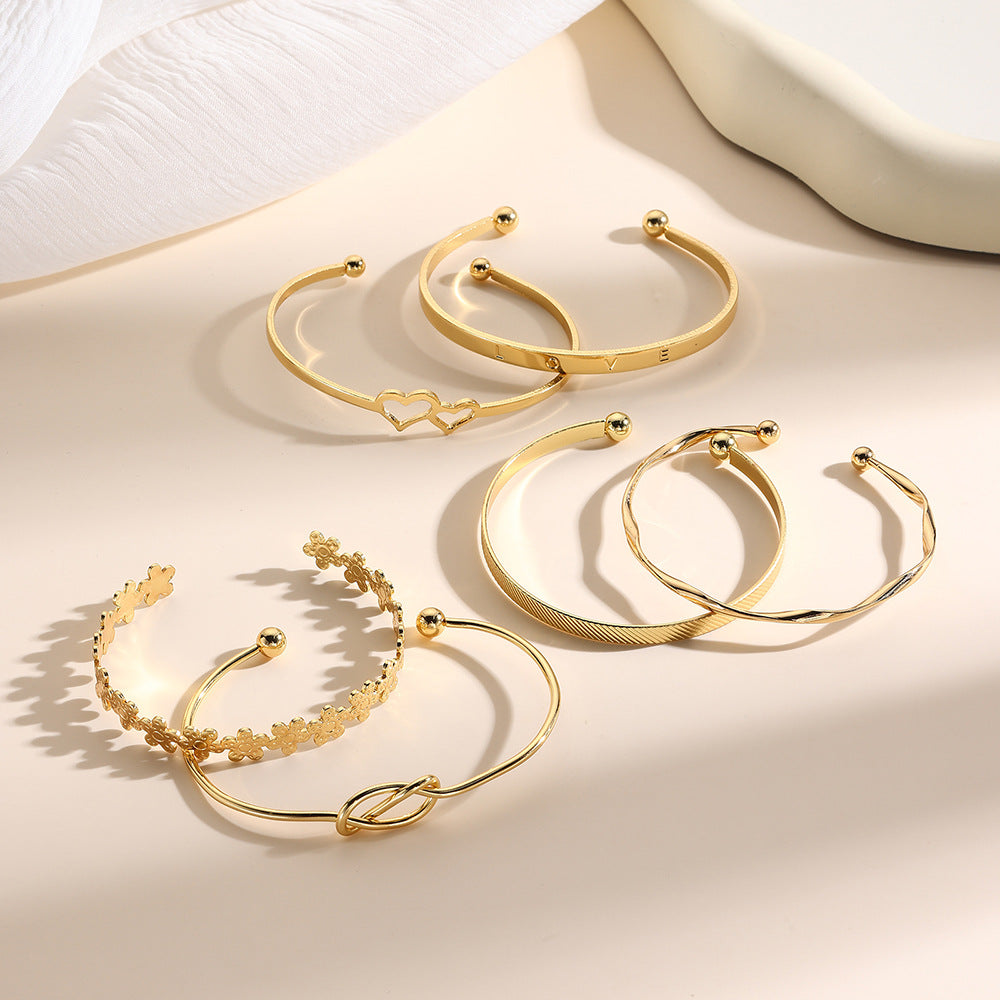 European and American cross-border alloy love knotted flower bracelet set geometric metal cross-stacked wear LOVE open bracelet
