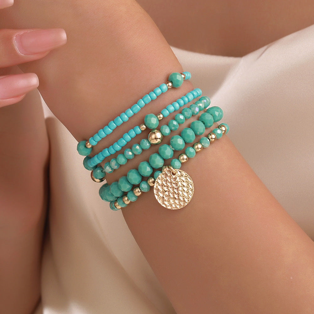 Bohemian fashionable and elegant elastic glass rice bead bracelet set, send girlfriends and girlfriends small fresh stacked bracelets