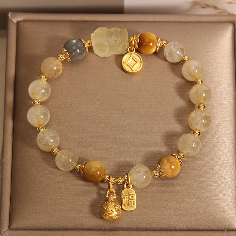 Natural golden crystal moonstone bracelet, female gold swallowing beast yellow tiger eye stone yellow hair crystal bracelet for girlfriend and girlfriend.