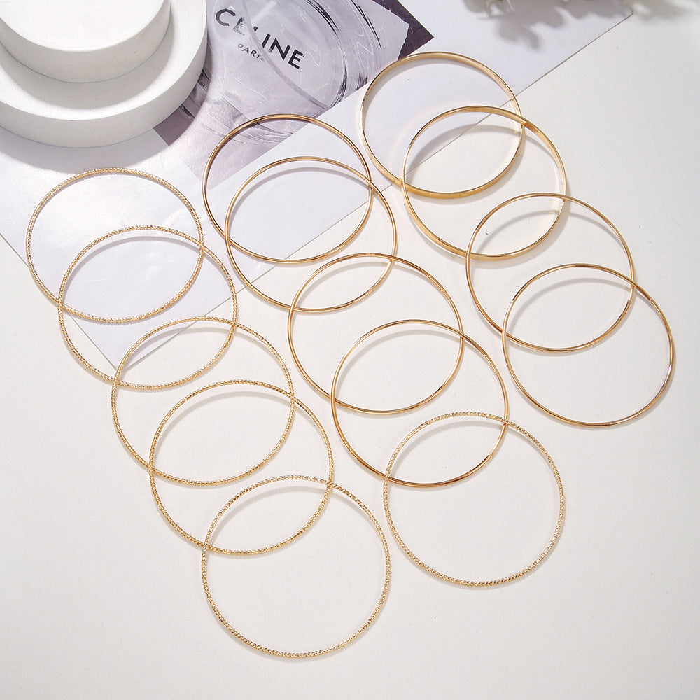 Personalized exaggerated wide-sided metal bracelet set, female bohemian gold glossy bracelet bracelet 14-piece set