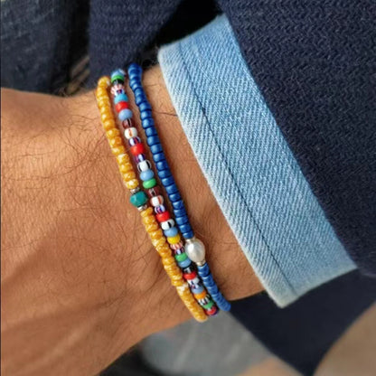 Bohemian vacation style elastic rice bead bracelet ins design sense niche contrasting colors stacked pearl men's bracelet