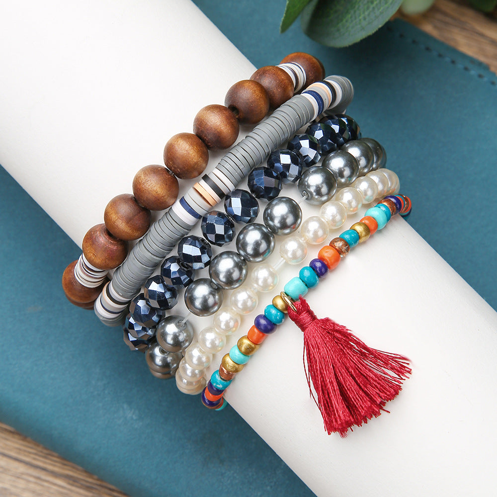 Cross-border fashion bohemian glass bead wood bead pearl bracelet multi-layer elastic soft pottery bracelet combination set