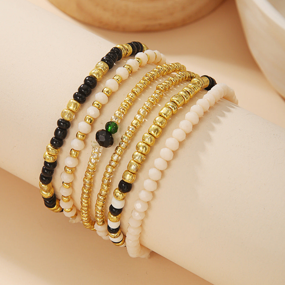 Bohemian vacation wind stacked wearing couple bracelet ins wind niche design sense rice bead elastic bracelet bracelet female